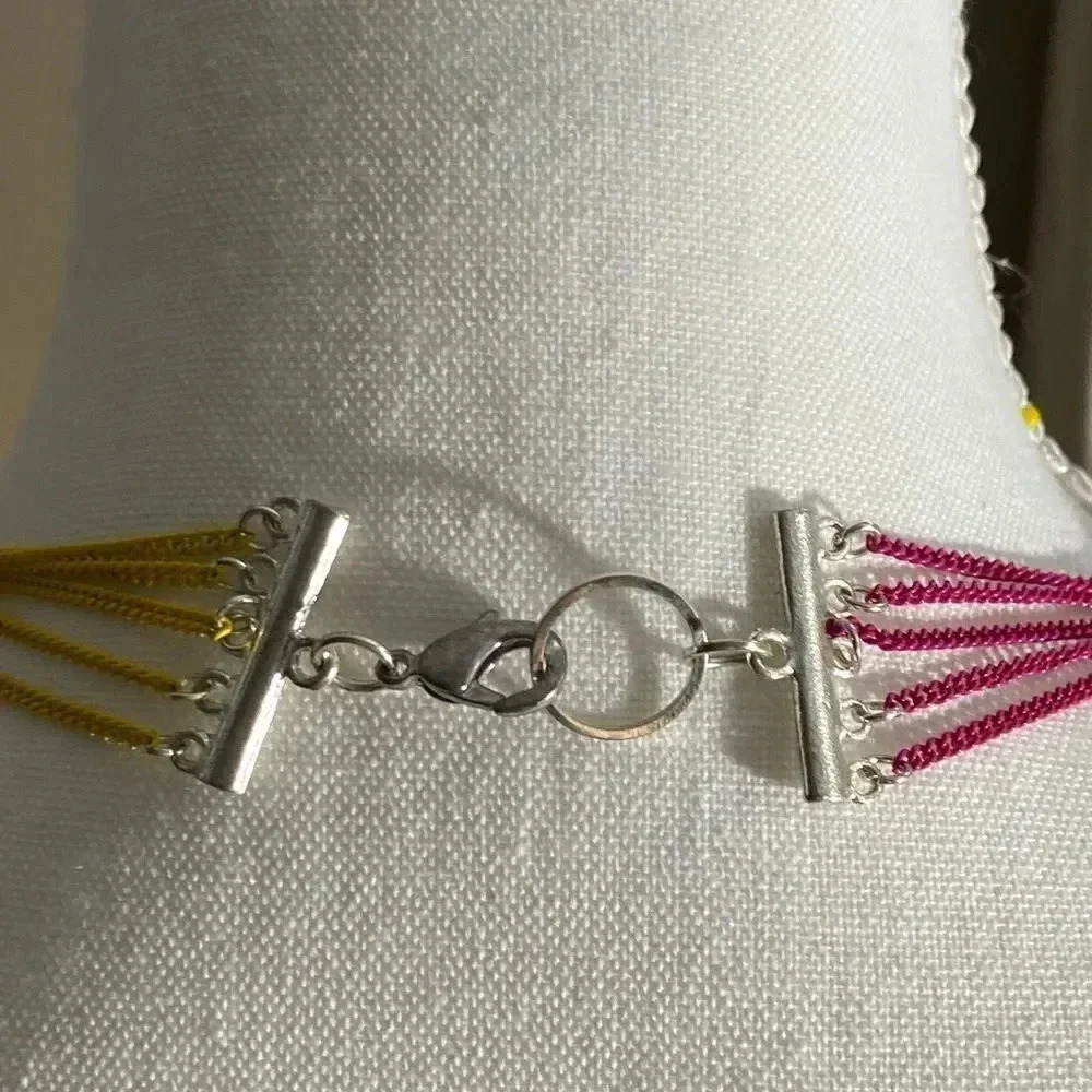 Long pink and yellow silver tone necklace - Picture 4 of 11
